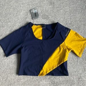 NWT Gymshark asymmetric crop top in navy and gold size XL never worn